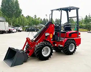 What is a compact articulated loader, and how does it function?