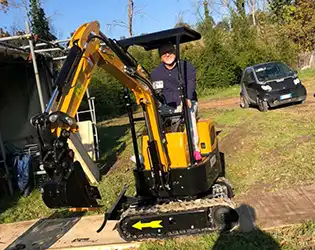 What are the typical dimensions and weight of a 1-ton mini excavator?