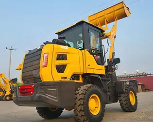 What is the difference between a small wheel loader and a skid steer loader?